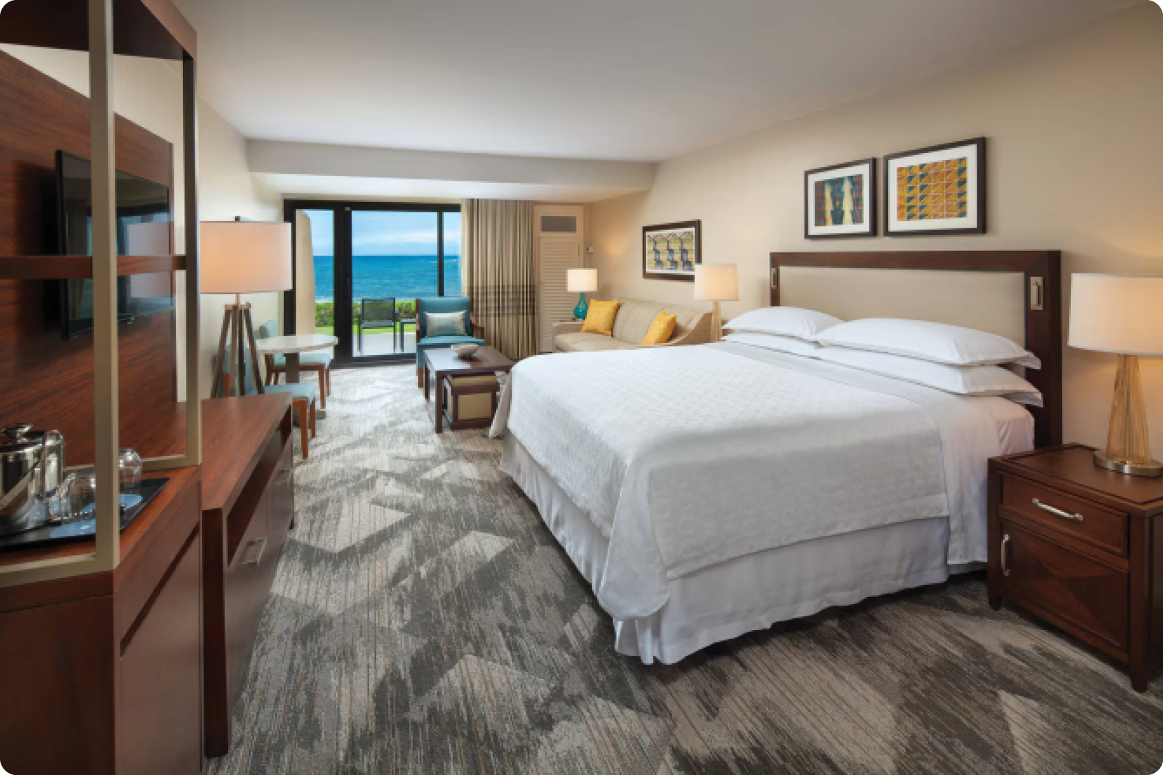 A bedroom with a large bed, a chair, a desk, and a TV. The bed is covered with a white comforter and has a yellow pillow. The room is clean and well-organized. AI generated content