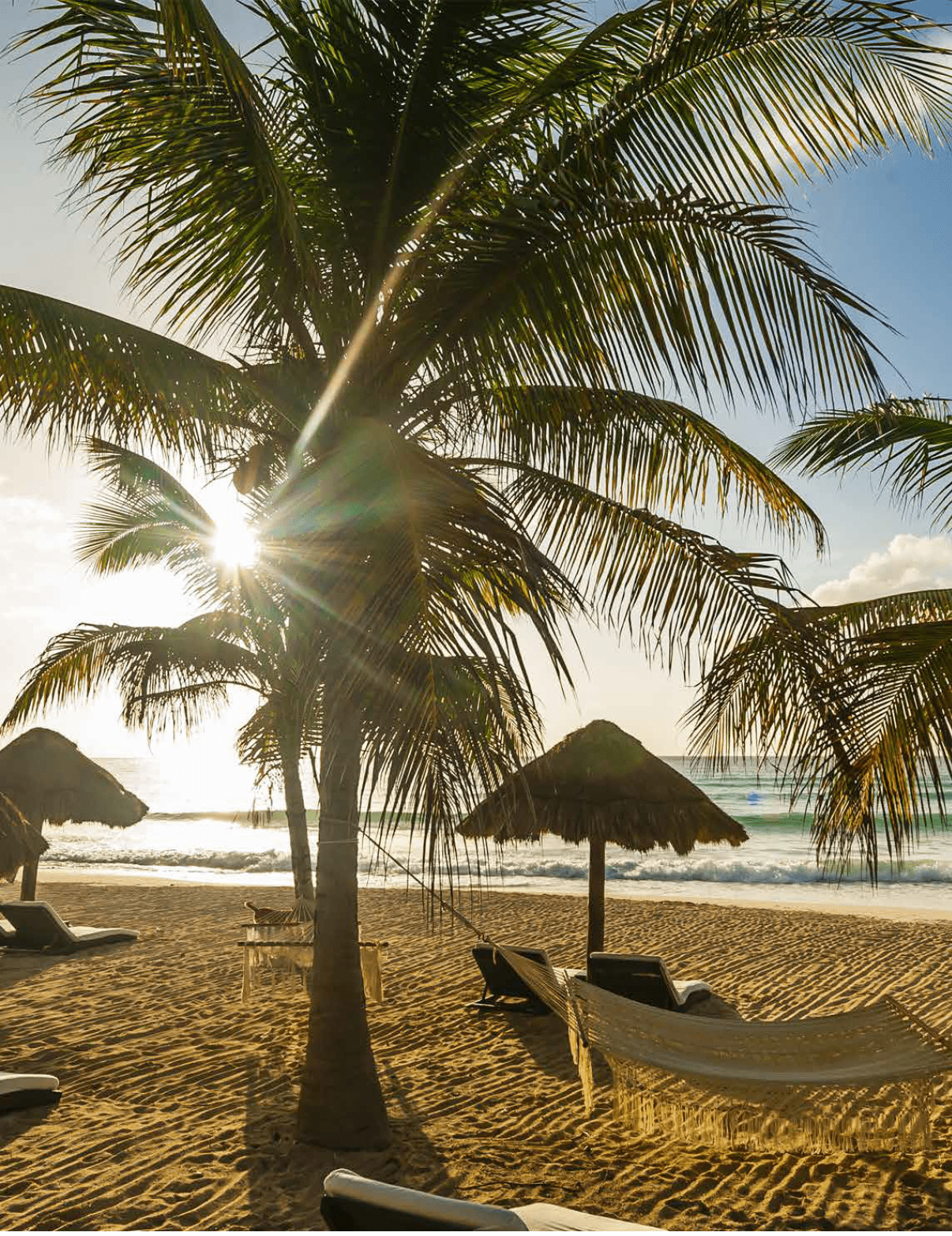 A beach scene with a palm tree and a sun umbrella. AI generated content