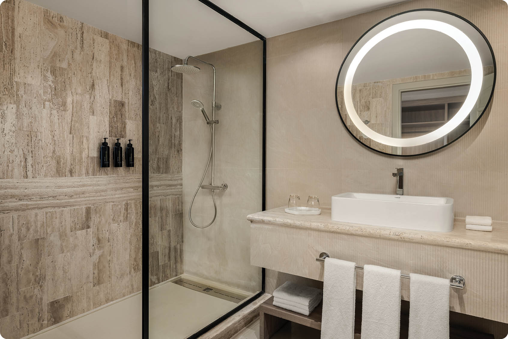 A bathroom with a shower, sink, and mirror. The mirror is round and has a light around it. AI generated content